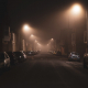 cars parked on side of the road during night time